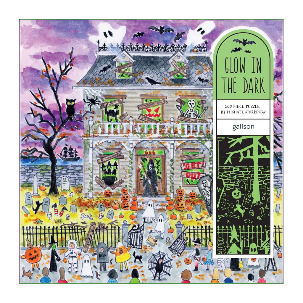 Halloween-themed puzzle with a house, ghosts, and pumpkins, box packaging front, on a white background.