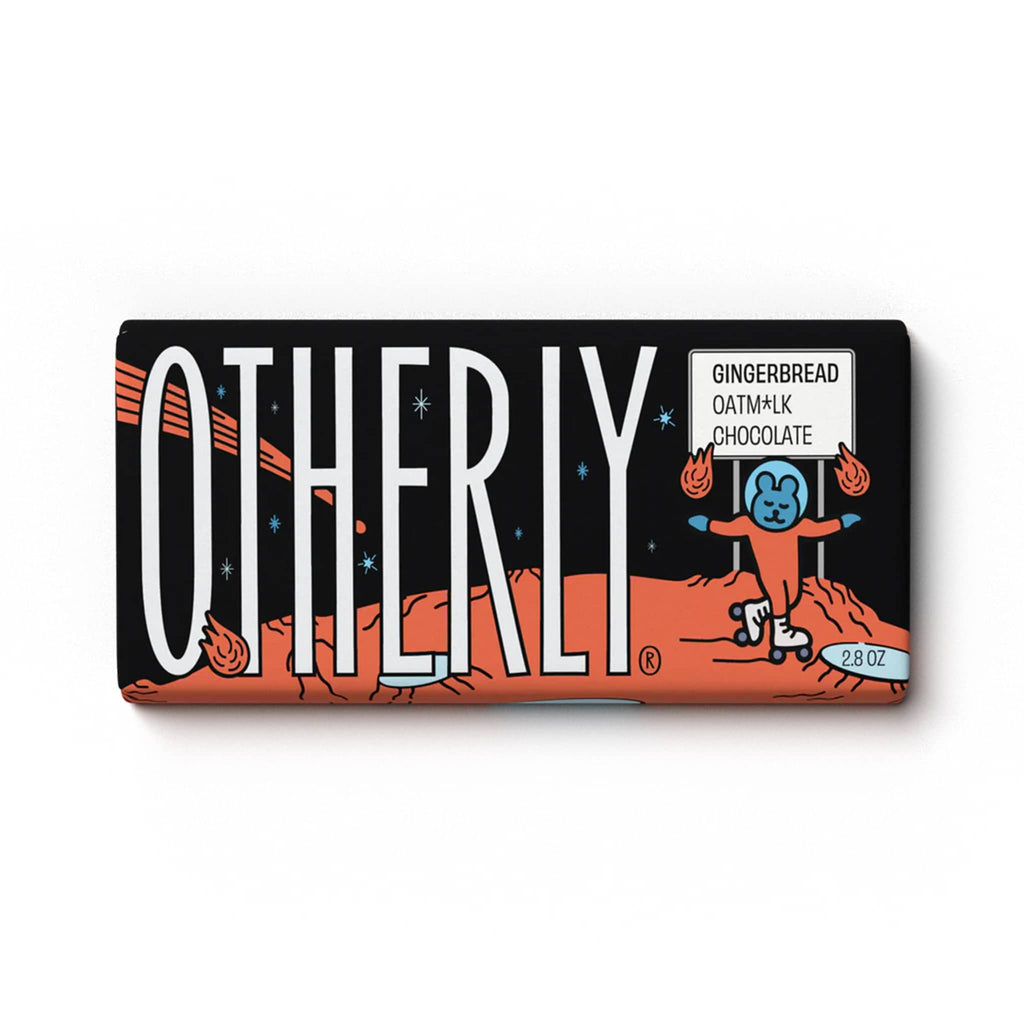 Otherly Gingerbread Oat Milk Chocolate Bar in wrapper with an illustration of a space scene in orange, black and blue tones.