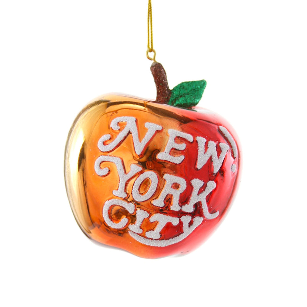 Cody Foster ombre red to yellow glass apple holiday tree ornament with "new york city" in white glitter lettering.