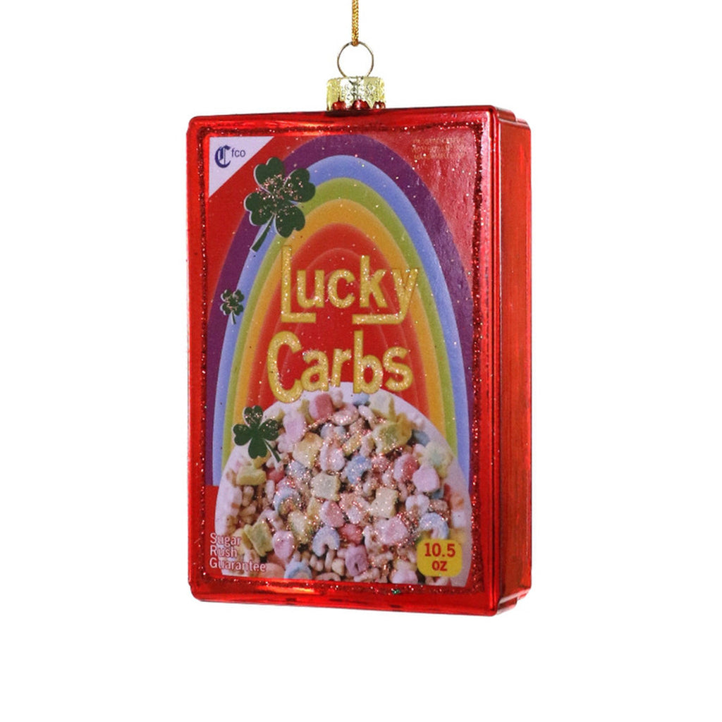 Cody Foster glass holiday tree ornament that looks like a cereal box with "lucky carbs" and a shiny red background.