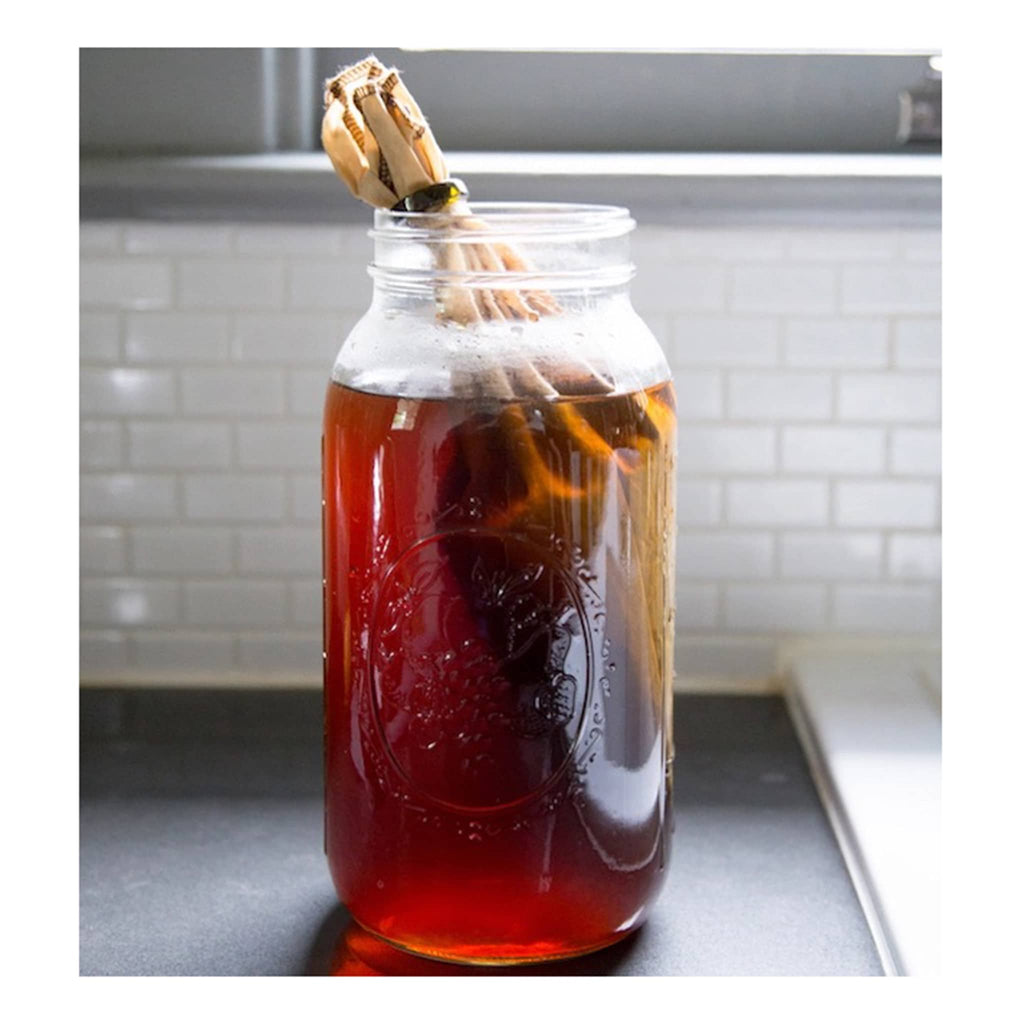 CoffeeSock DIY Cold Brew Coffee making kit, coffee brewing in glass canning jar on the counter.