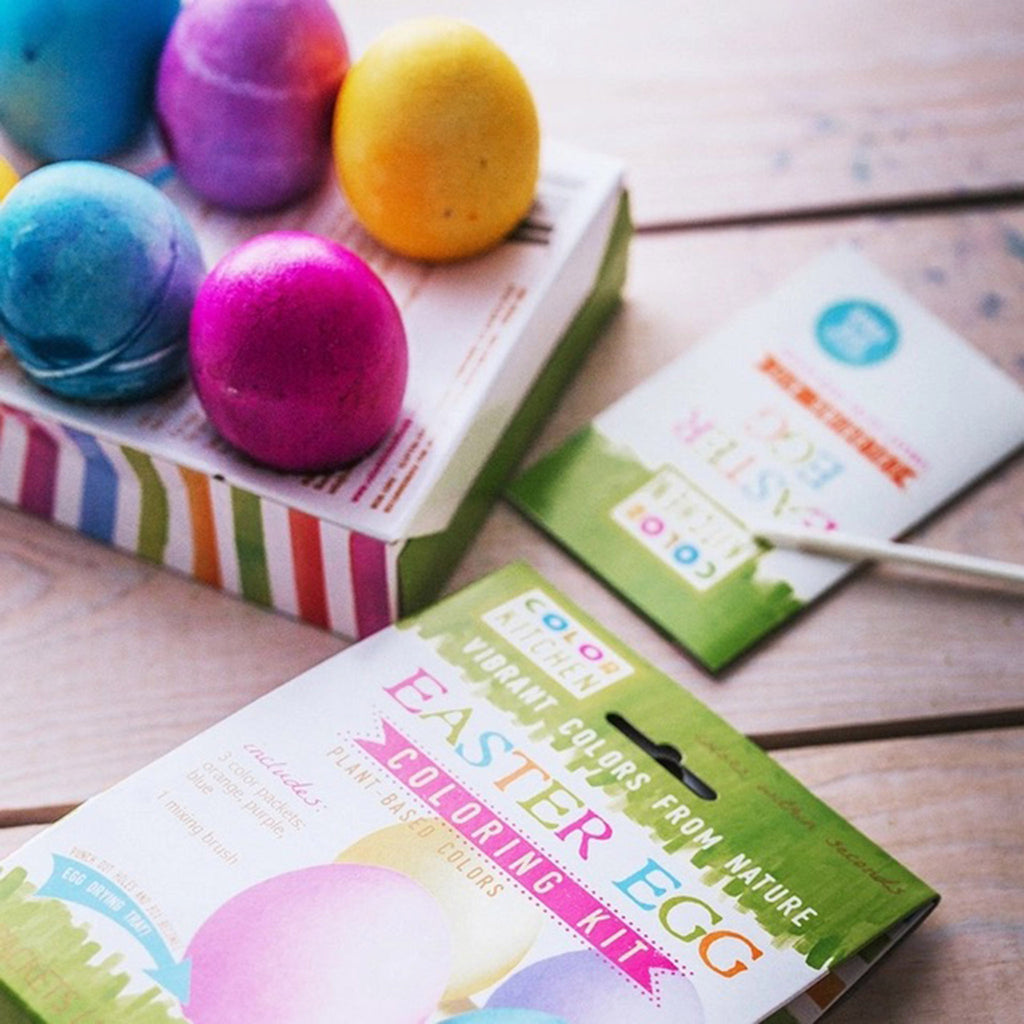 ColorKitchen vibrant plant-based easter egg coloring kit with packaging and sample dyed eggs in box drying tray.
