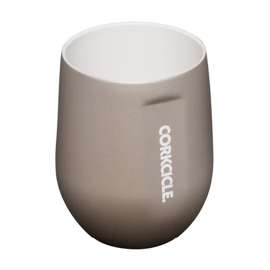 Corkcicle Pure Taste 12 ounce stemless insulated latte-colored stainless steel cup with oat milk colored ceramic lined interior, slightly overhead view.