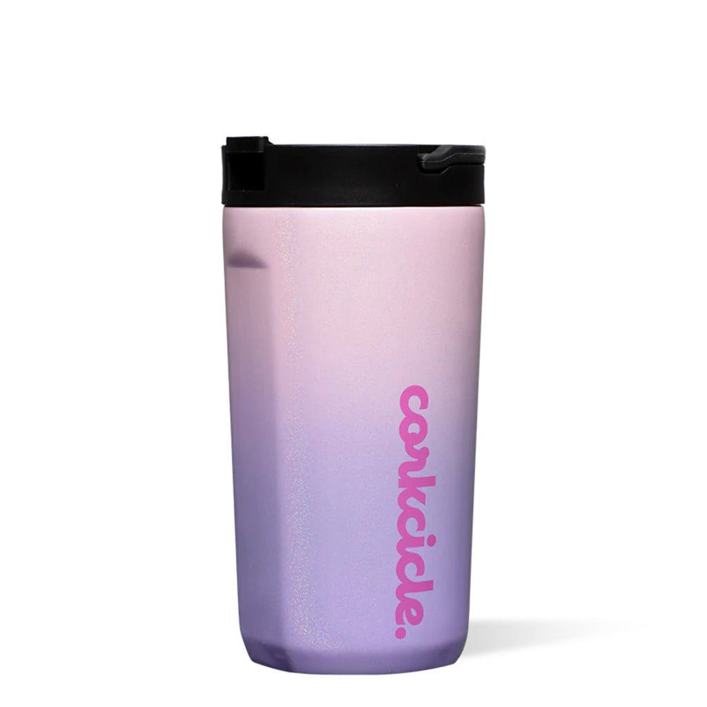 Corkcicle Ombre Fairy 12 ounce Insulated Stainless Steel Kids Cup with a glittery pink to purple ombre pattern, black lid and fuchsia corkcicle script logo, front view.