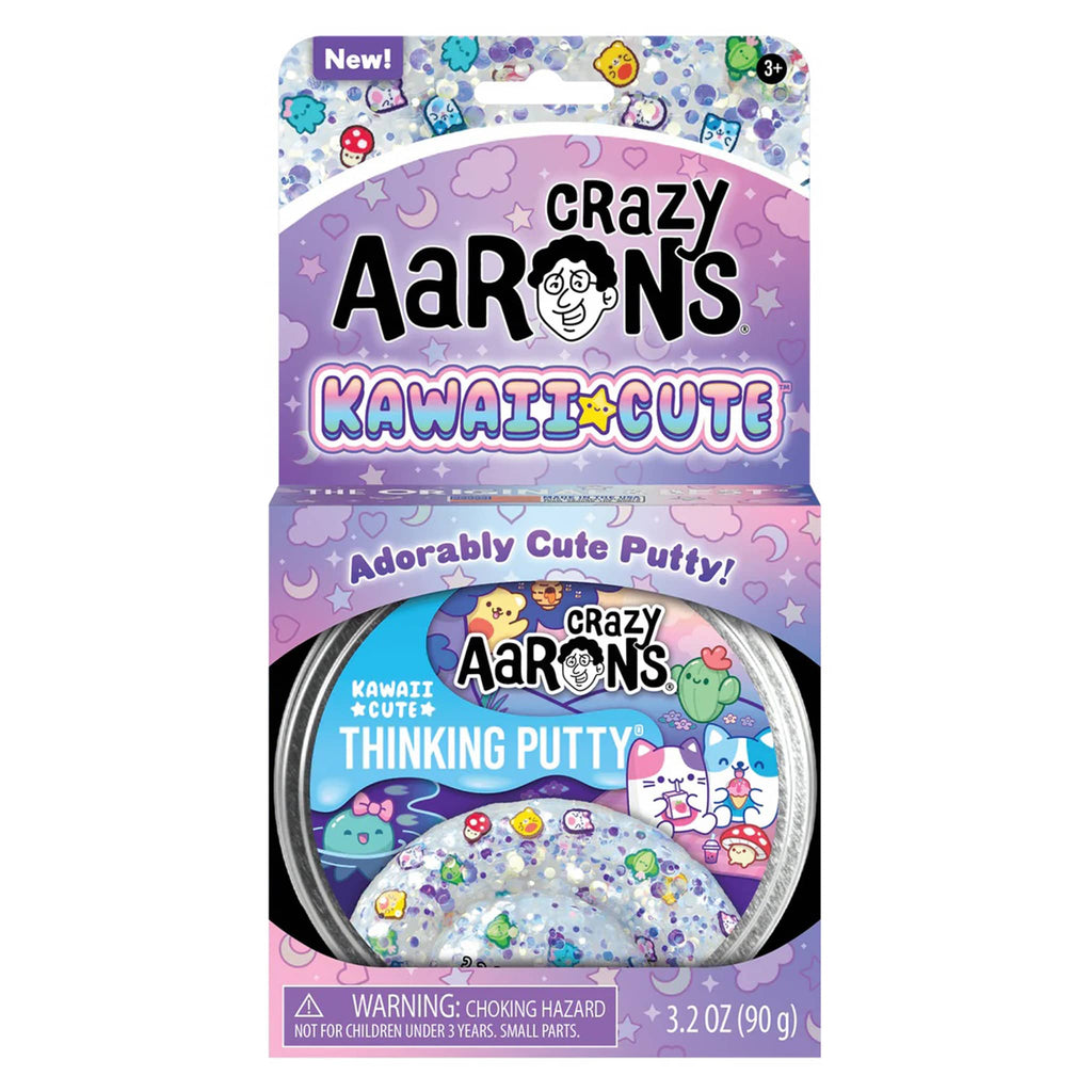 Crazy Aaron's Kawaii Cute clear thinking putty with kawaii-themed clay pieces in tin, in box packaging, front view.