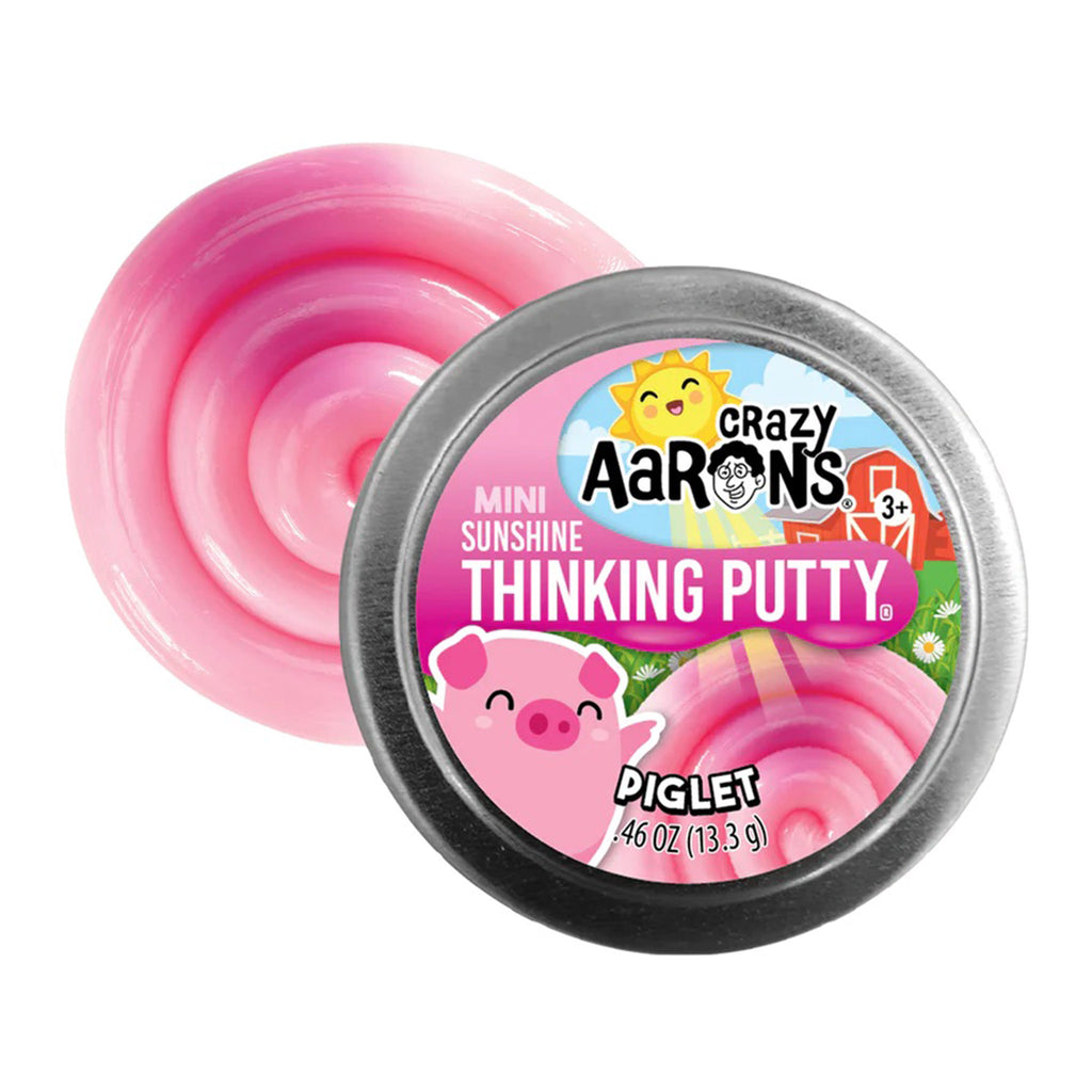 Crazy Aaron's Piglet Mini Sunshine Thinking Putty tin packaging with a swirly blob of putty, the putty changes color from pink to fuchsia in sunlight.
