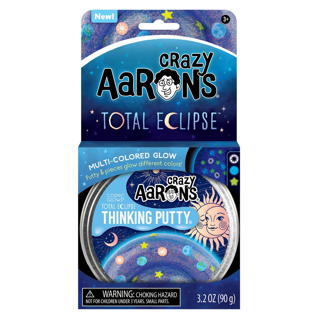 Crazy Aaron's Total Eclipse Cosmic Glow Thinking Putt in 4 inch tin, in packaging.