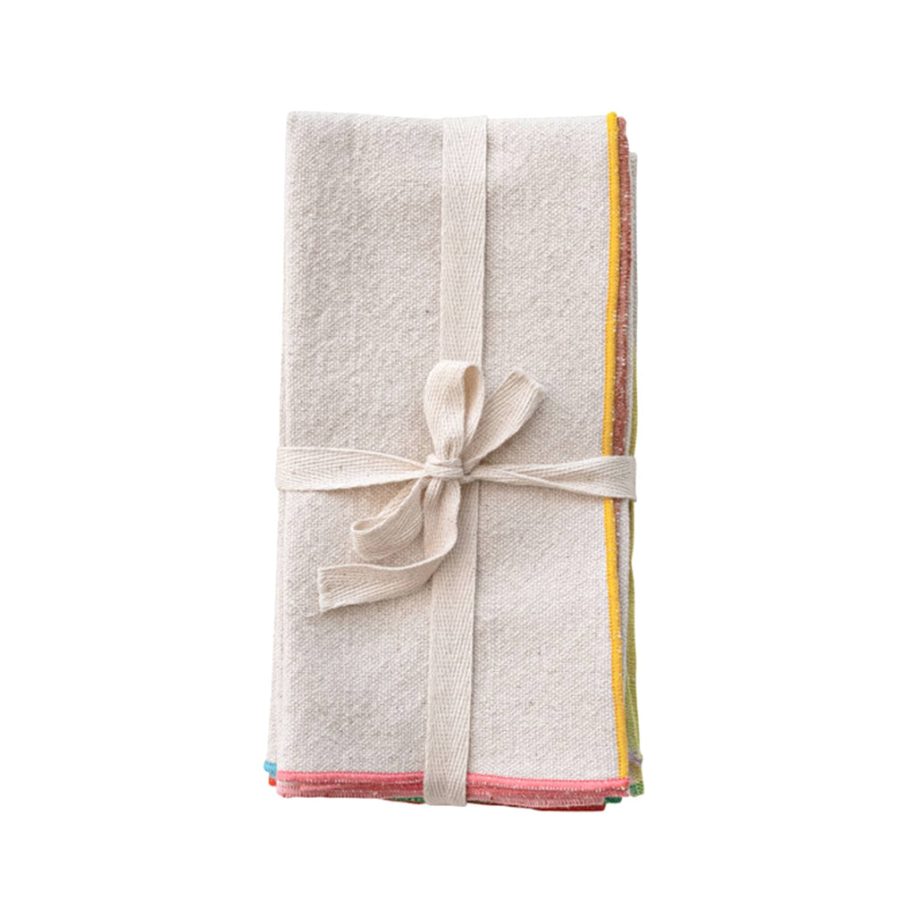 Creative Co-op square woven cotton cocktail napkins with colorful stitched edge, set of four tied up with a ribbon.