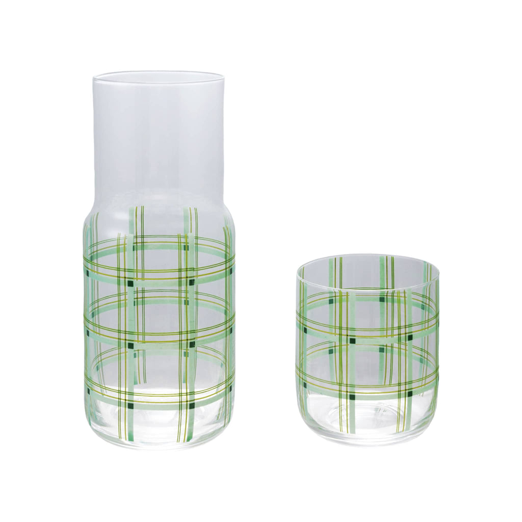 Creative Co-op Green Plaid glass carafe with matching drinking glass beside it.