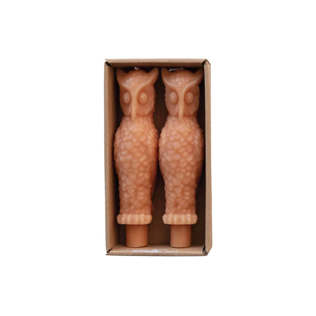 Creative Co-op Blush Pink Owl Unscented Taper Candles, set of 2 in kraft box packaging.