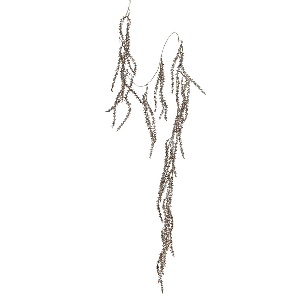 Decorative garland of tiny faux leaf strands in gold, on a white background.