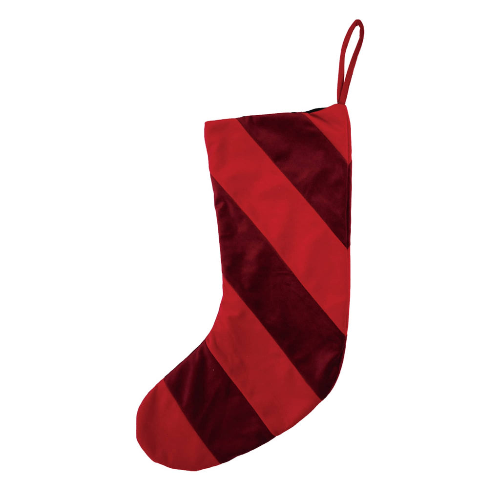 Red velvet striped Christmas stocking on a white background.
