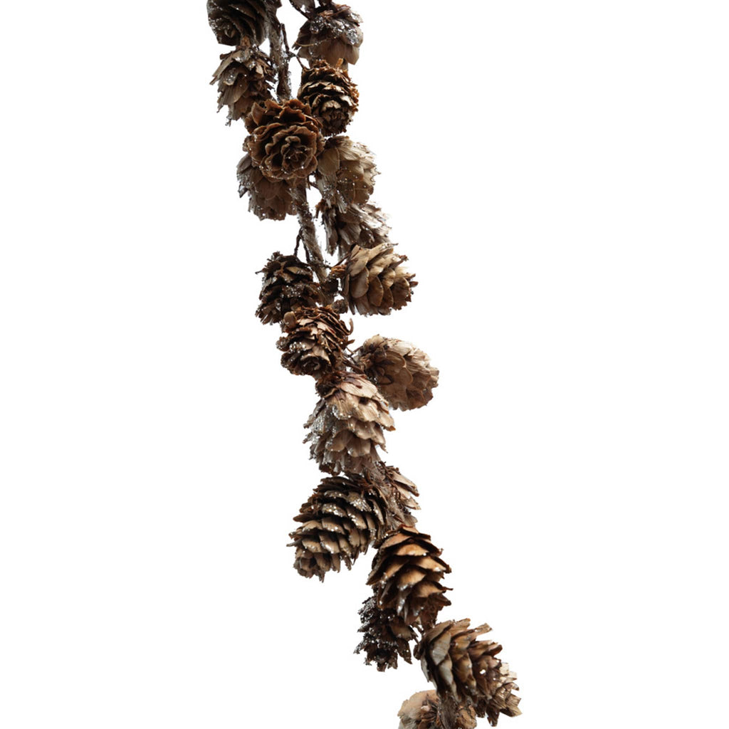 Pinecone garland with glitter, detail, on a white background.