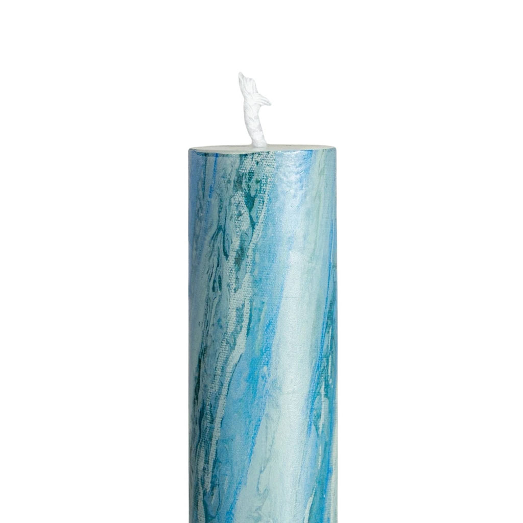 Creative Co-op unscented marbled blue taper candle, detail of wick.