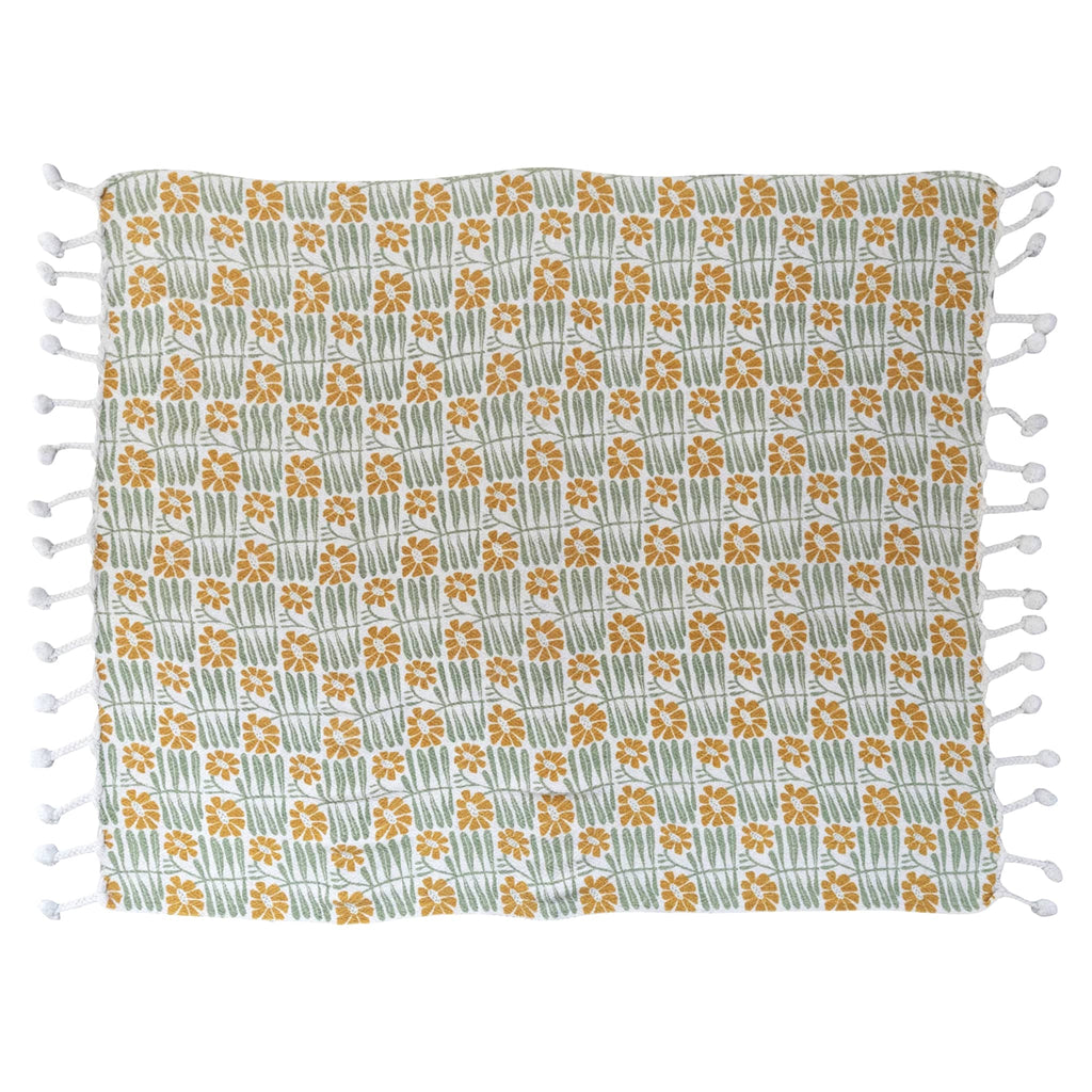 Creative Co-op woven recycled cotton blend mustard and sage floral print throw with braided pompom tassels, full front view.