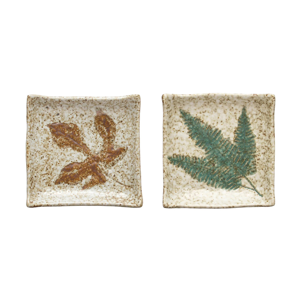 Creative Co-op Reactive Glazed Stoneware Plate with embossed leaf pattern in rust or green.