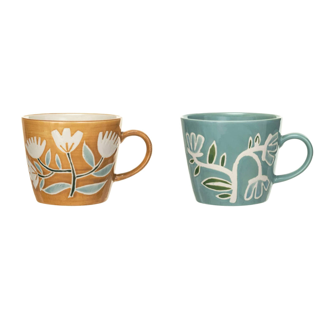 Creative Co-op 8 ounce hand-painted stoneware mugs in mustard and blue with wax relief flower design.