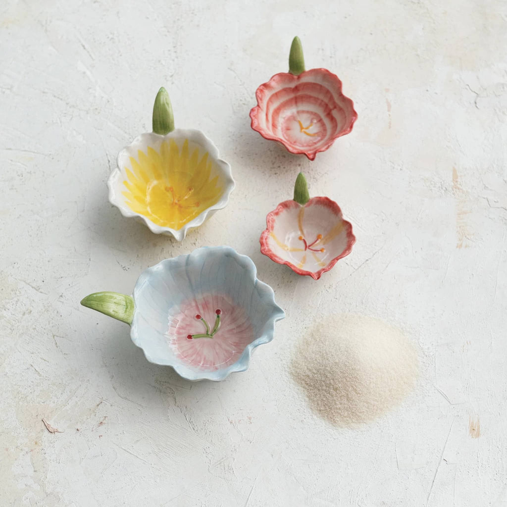 Creative Co-op Hand Painted Stoneware Flower Shaped Prep Bowls, set of 4 shown individually, overhead view.