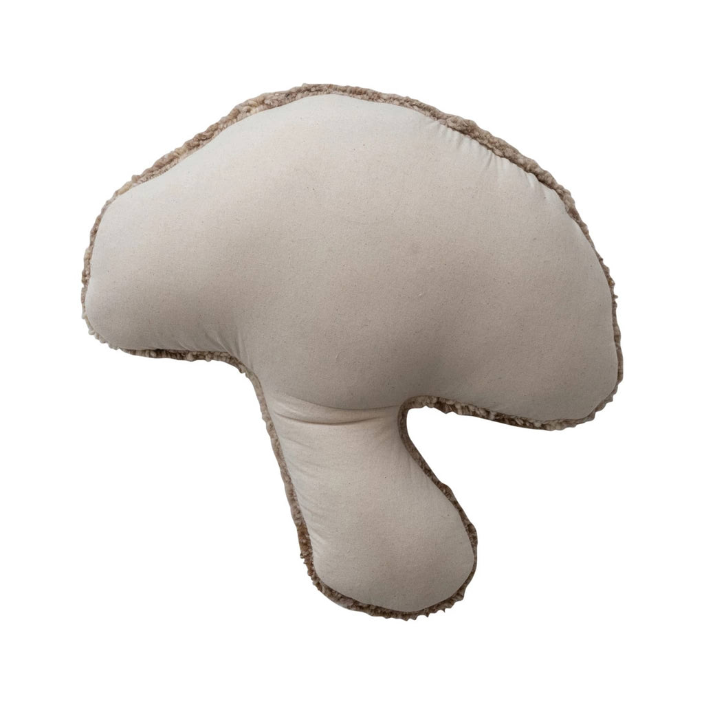 Back view of mushroom-shaped throw pillow with plain natural cotton backing, on a white background.