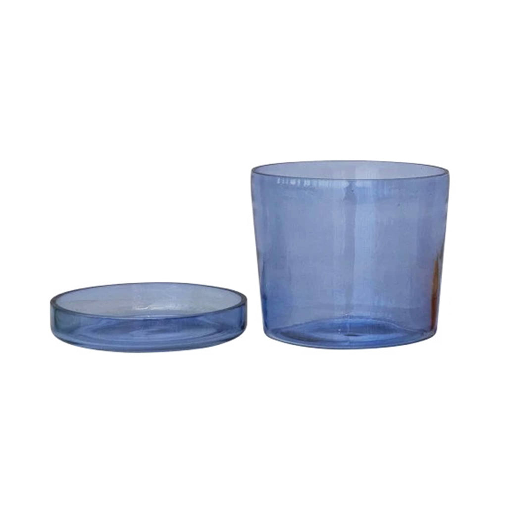 Blue glass planter with matching saucer beside it, on a white background.