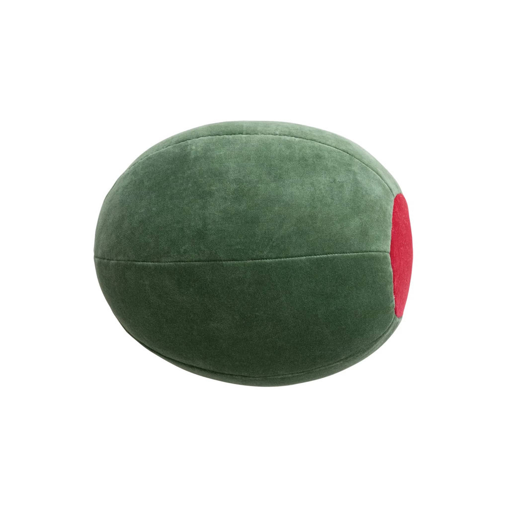 Green olive shaped cotton velvet pillow with red center, side view.