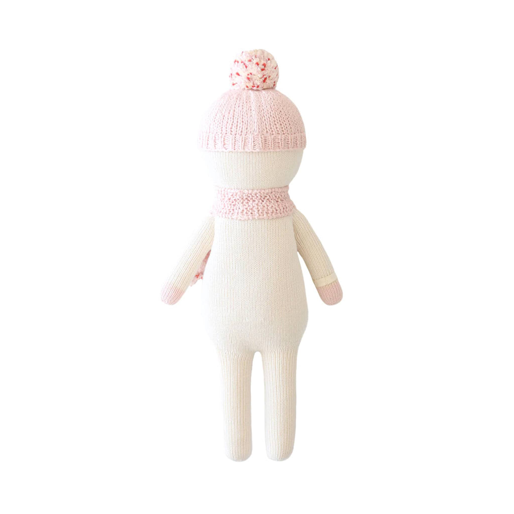 White snowman knit toy with pink hat and scarf, back view, on a white background.