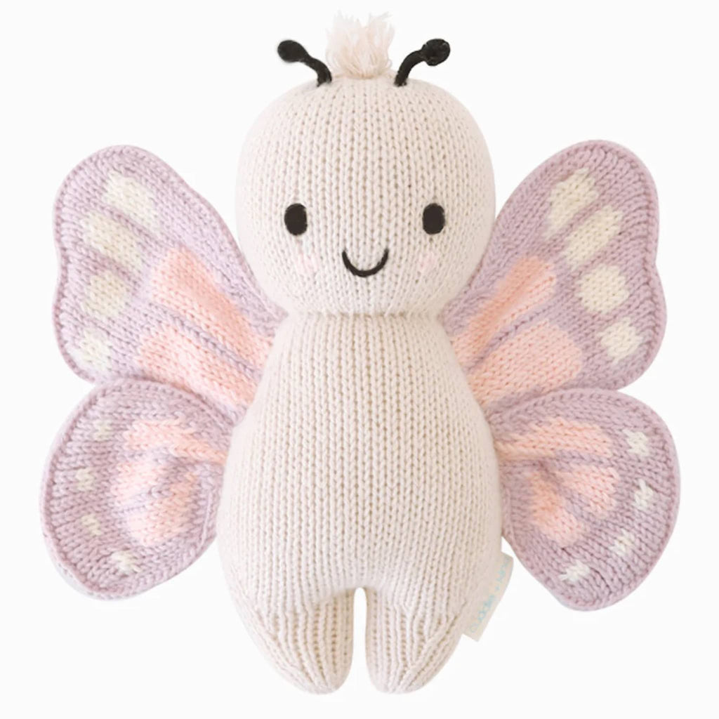 Cuddle and Kind Baby Butterfly hand knit doll, front view.