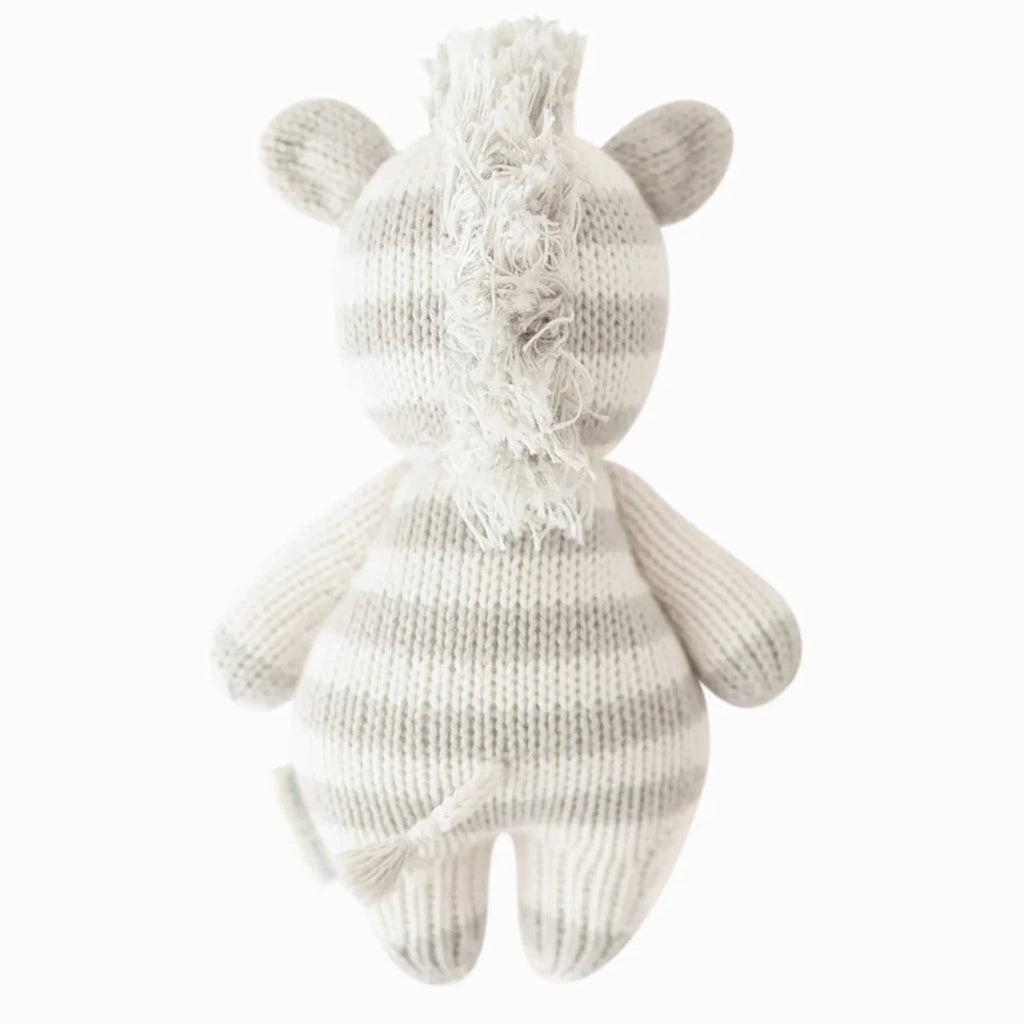 Cuddle and Kind Baby Zebra hand knit doll, back view.