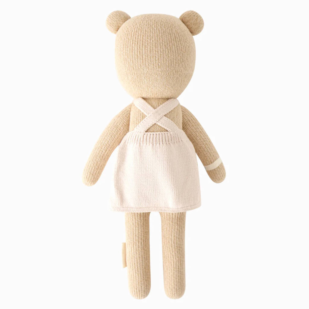 Cuddle and Kind Little Goldie the Honey Bear hand knit doll, back view.