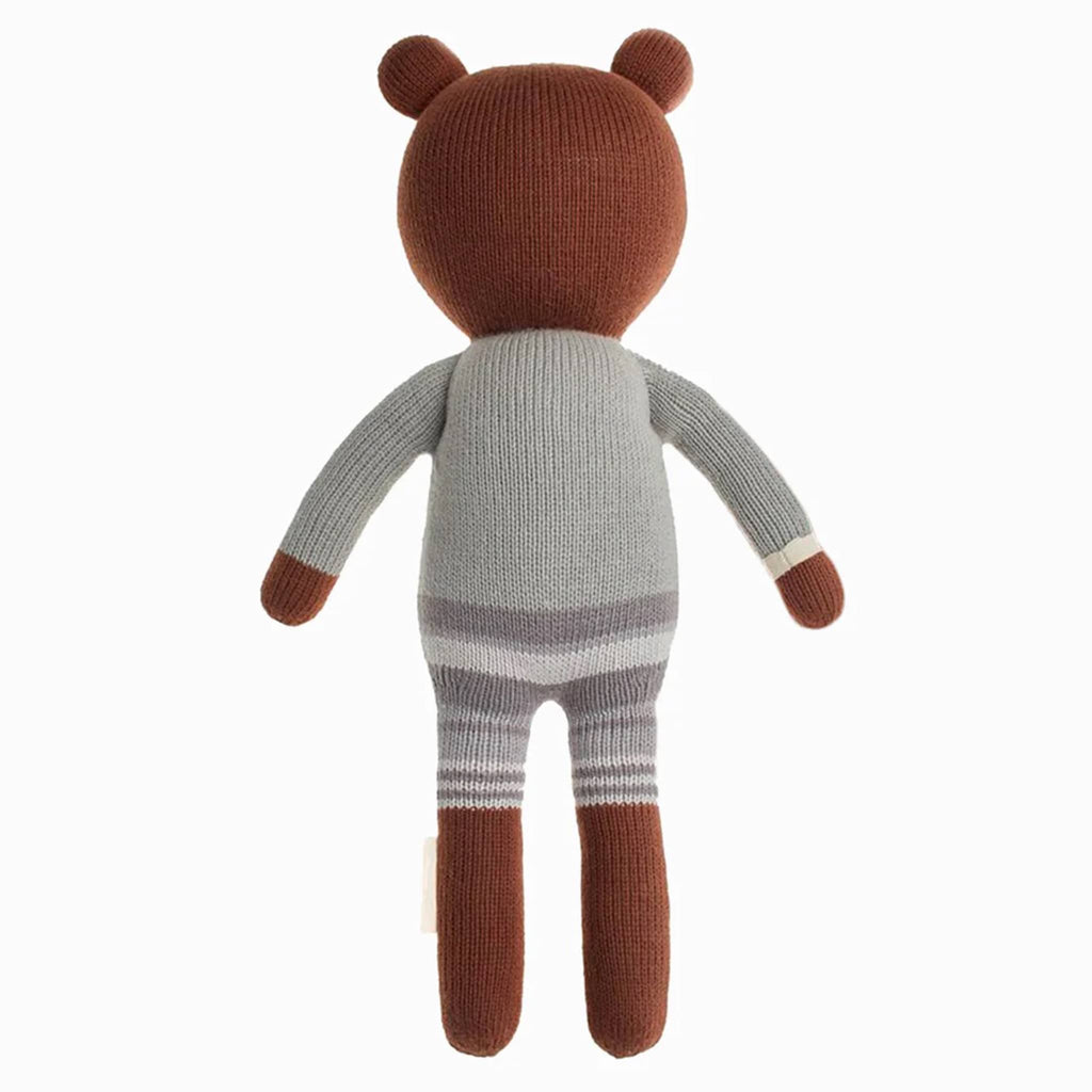 Cuddle and Kind Little Oliver the Bear hand knit doll, back view.