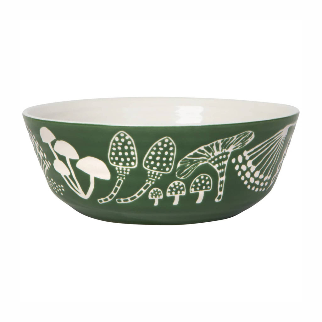 Green bowl with white mushroom pattern on a white background.