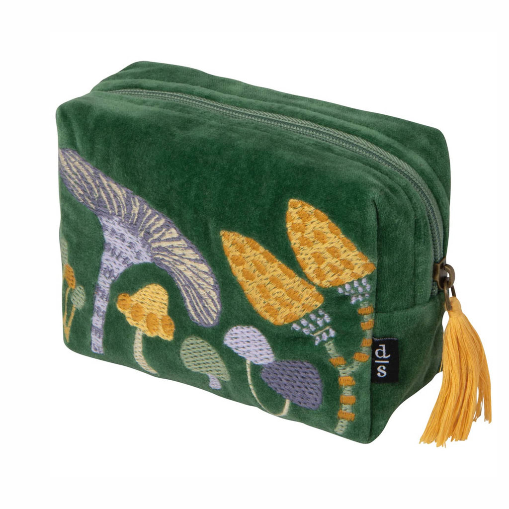 Green velvet pouch with embroidered mushroom designs and a yellow tassel, front angle, on a white background.