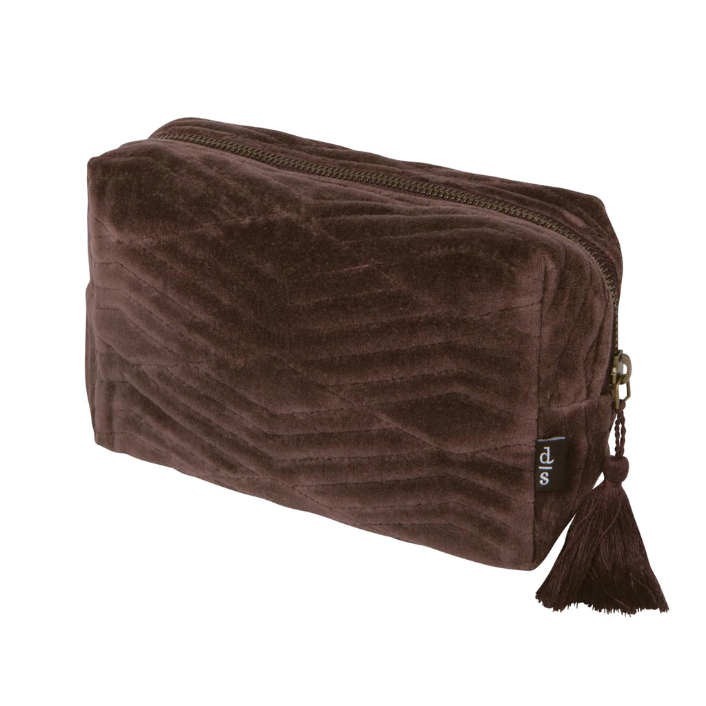 Fig color quilted velvet pouch with a tassel, front angle view, on a white background.