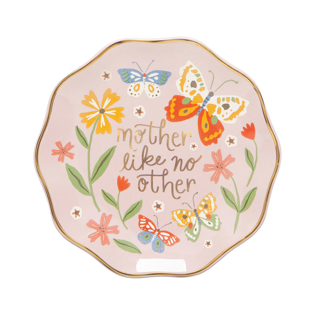 Danica pink stoneware dish with "mother like no other" in gold foil lettering surrounded by colorful butterflies and flowers on a pink background with scalloped edge and gold trim.