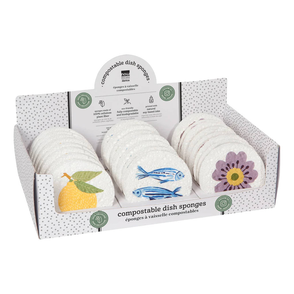 Danica Market Day compostable dish sponges in 3 designs in countertop display.