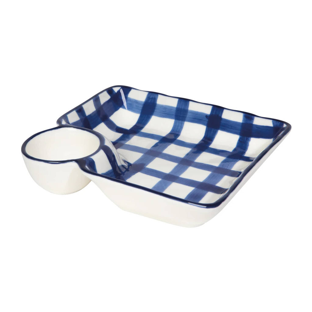 Ceramic dish with blue and white checkered pattern on a white background.