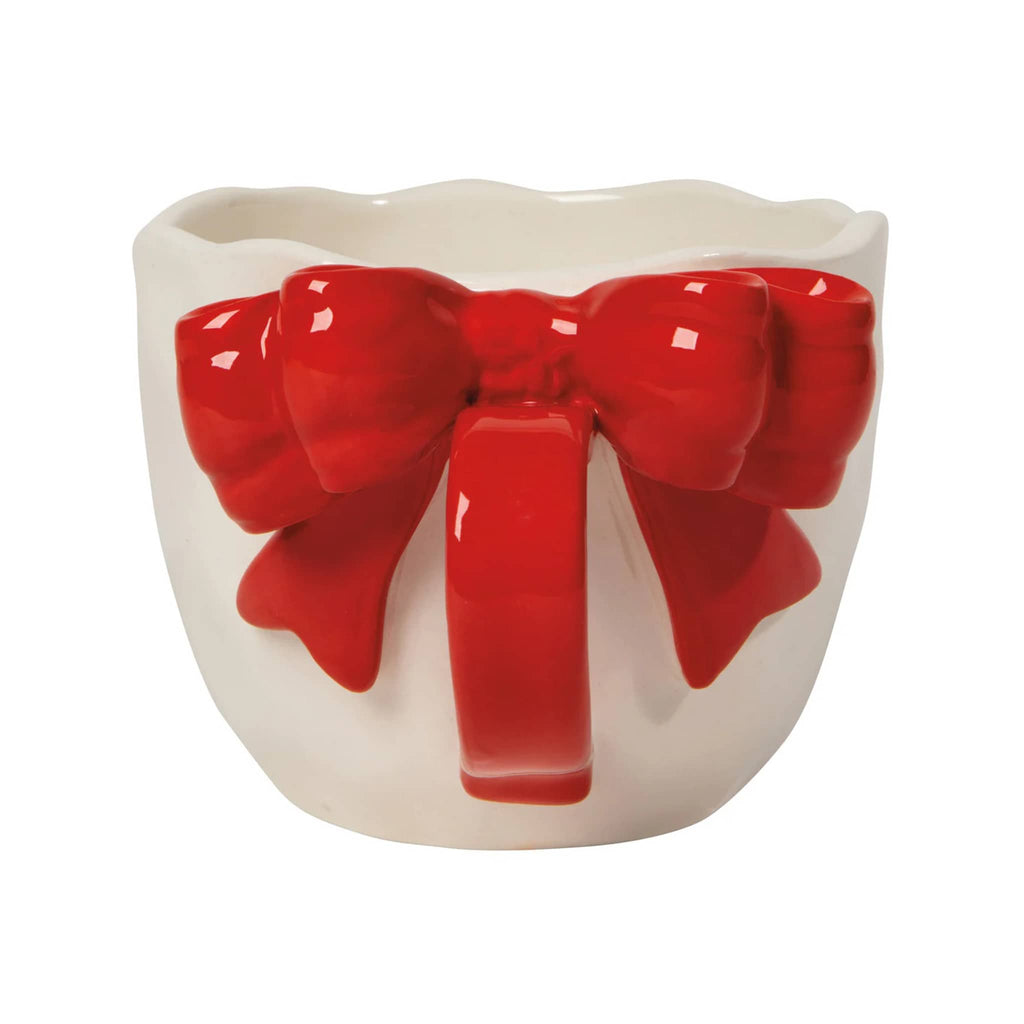 White ceramic bowl with a large red bow on a white background.