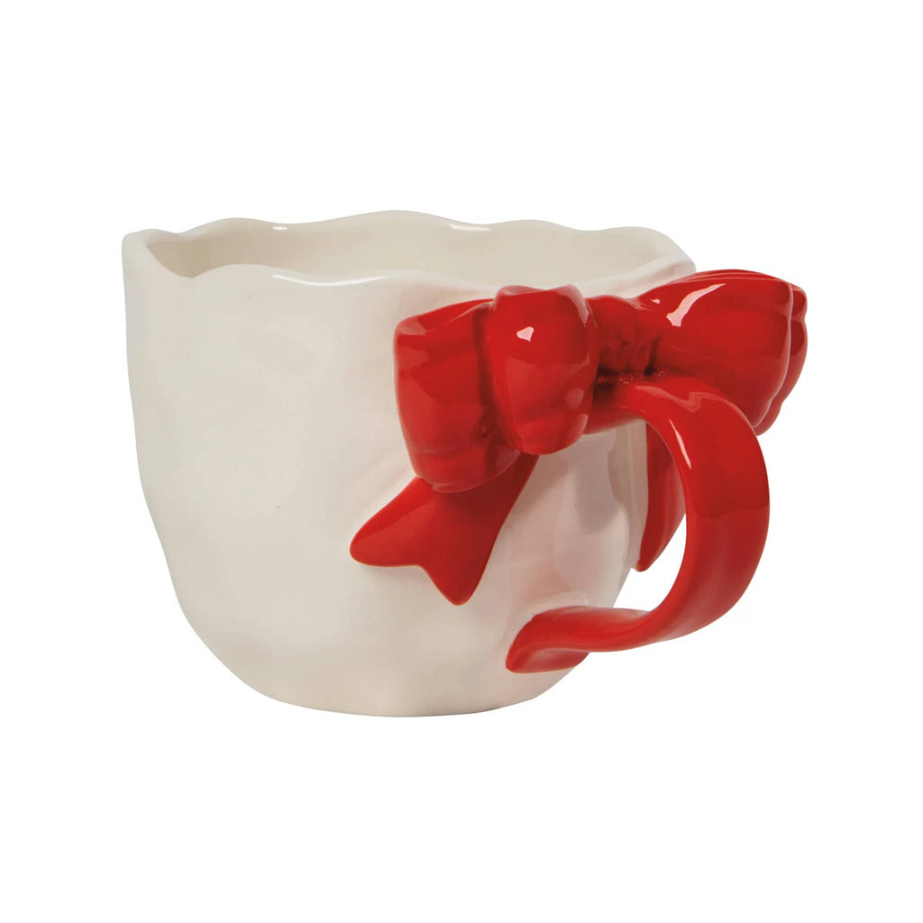 White mug with a red bow and handle on a white background.