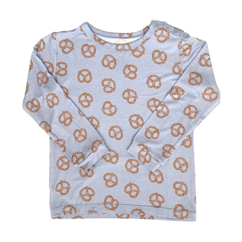 Dear Perli baby and toddler pajama sets in pretzel twists, top shown.