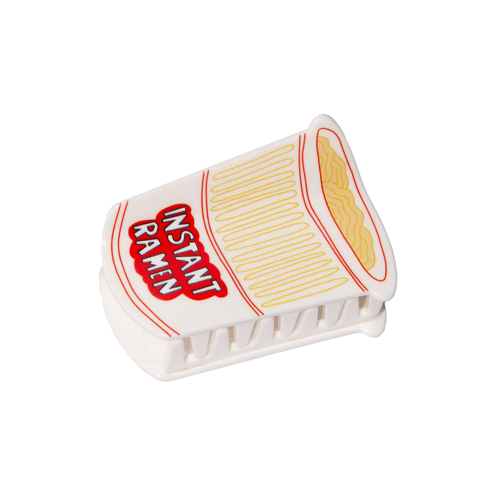 Instant ramen cup-shaped plastic hair claw on a white background.
