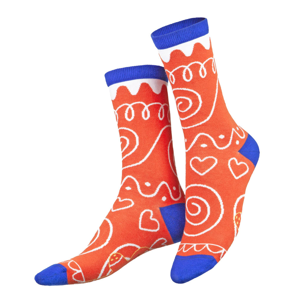 Red socks with white patterns and blue accents on a white background.