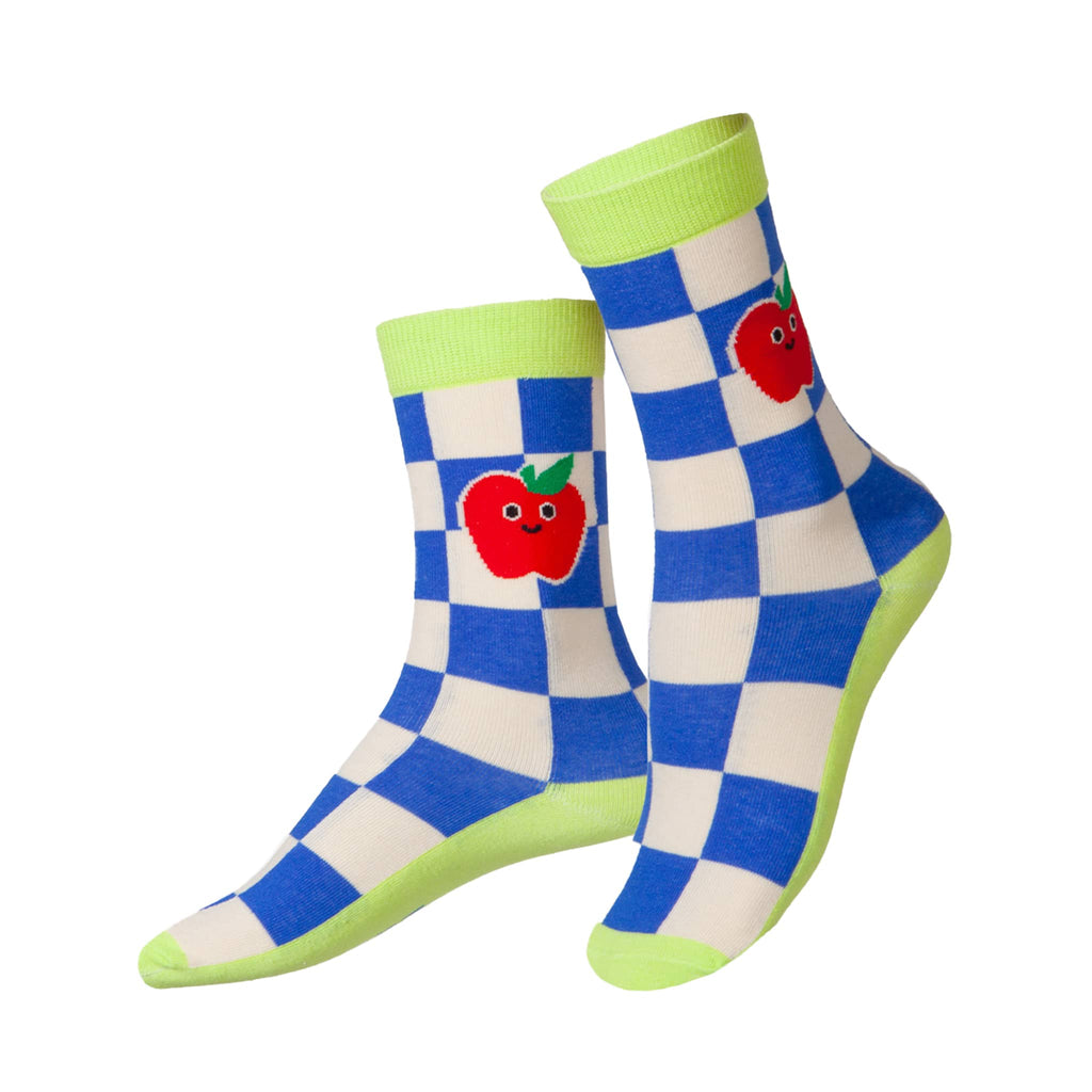 Blue and white checkered kids crew socks with red apple design on a white background.