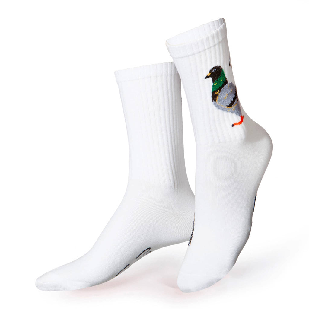 White crew socks with a colorful pigeon design on a white background.