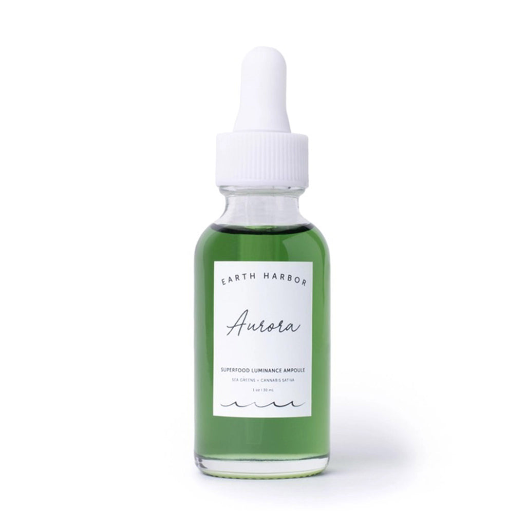 Earth Harbor Aurora Superfood Luminance Ampoule in 1 ounce clear glass bottle with eyedropper, front view.
