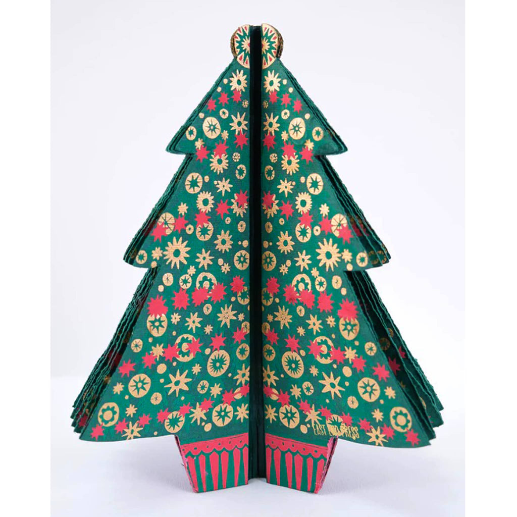 Decorative paper Christmas tree with star ornament pattern on a white background.