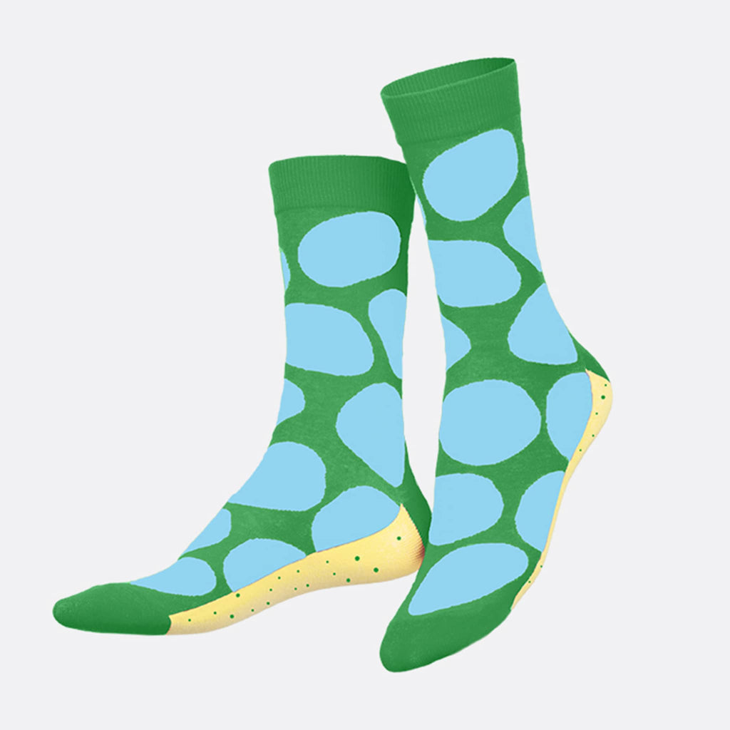 DOIY Eat My Socks Salty Chips unisex crew socks with yellow, green and blue pattern on foot forms.