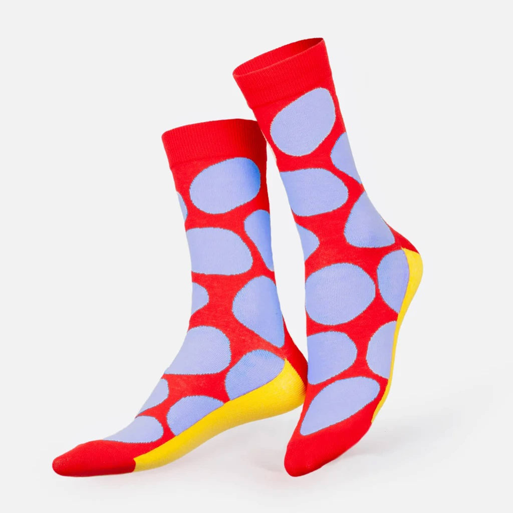 DOIY Eat My Socks Salty Chips unisex crew socks with red, yellow and blue pattern on foot forms.