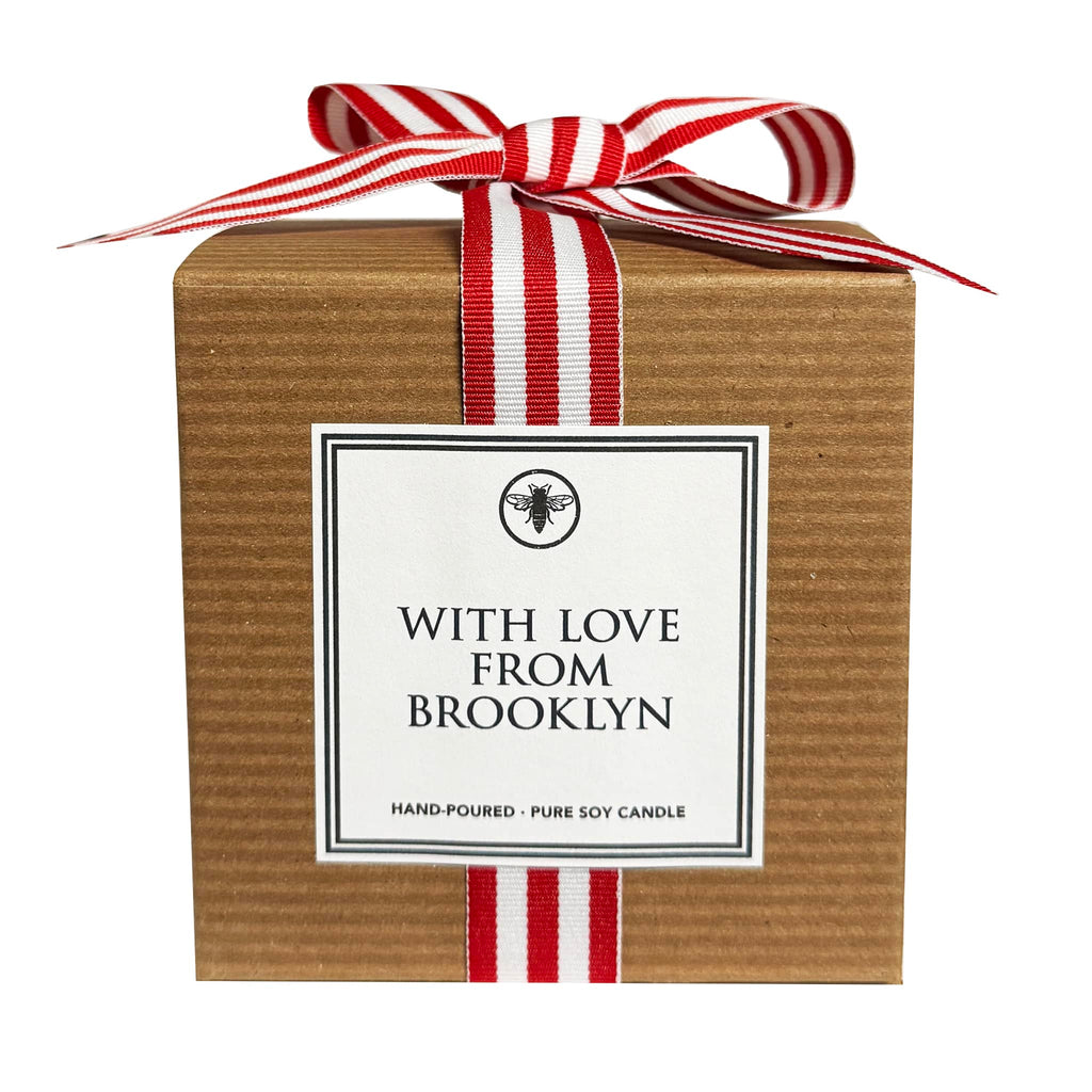 Kraft box with a red and white striped ribbon and 'With Love from Brooklyn' label on a white background.