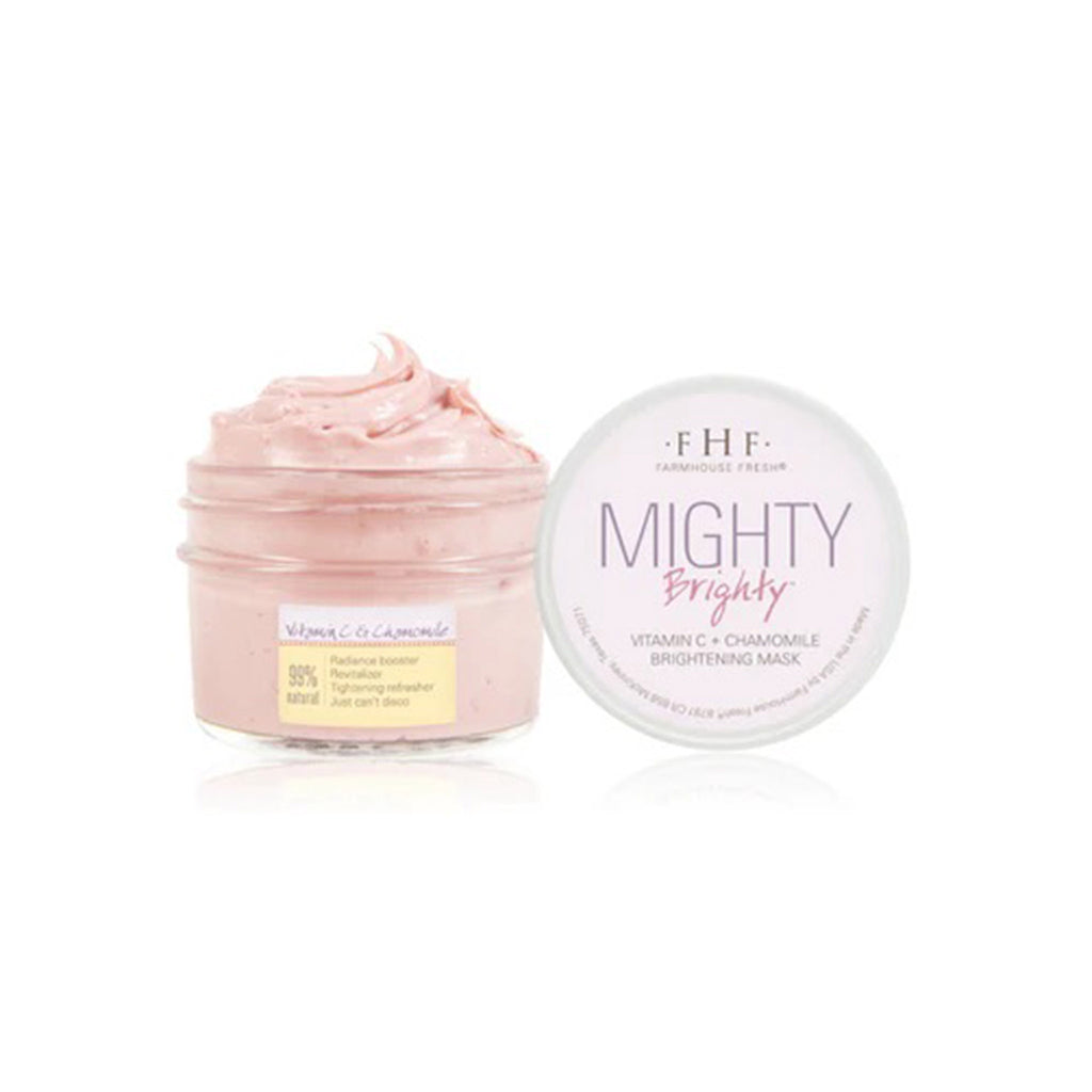 FarmHouse Fresh Mighty Brighty Vitamin C + Chamomile Brightening Mask in glass jar with lid off and product whipped up.