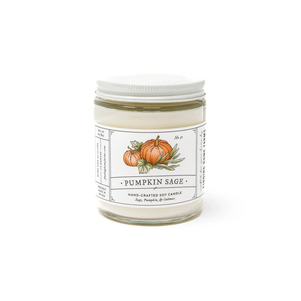 Finding Home Farms 7.5 ounce pumpkin sage scented soy wax candle in glass jar with metal lid and white label with pumpkin illustration on it inspired by vintage seed packets.